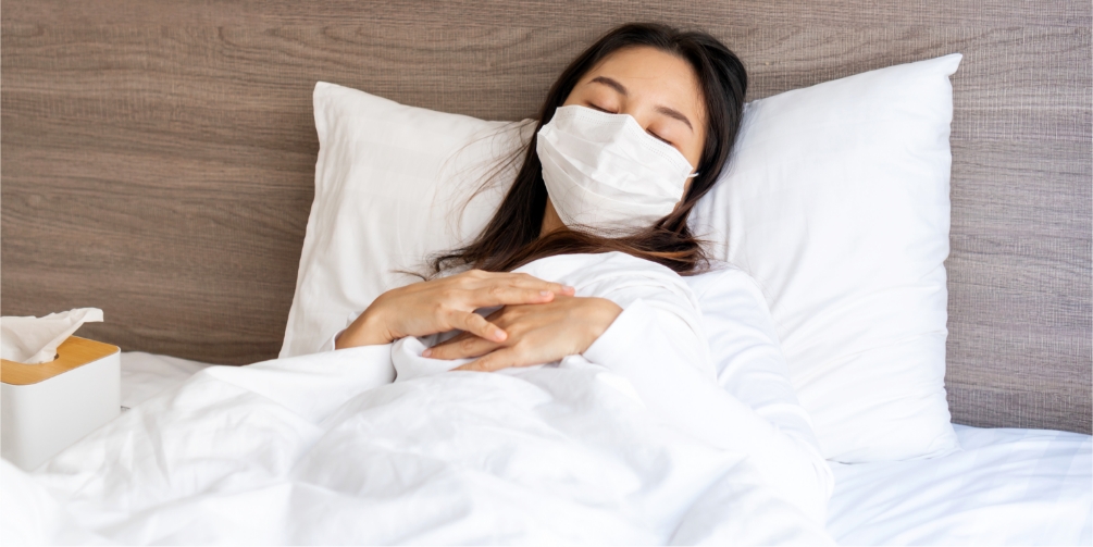 風邪で寝込んでいるイメージ